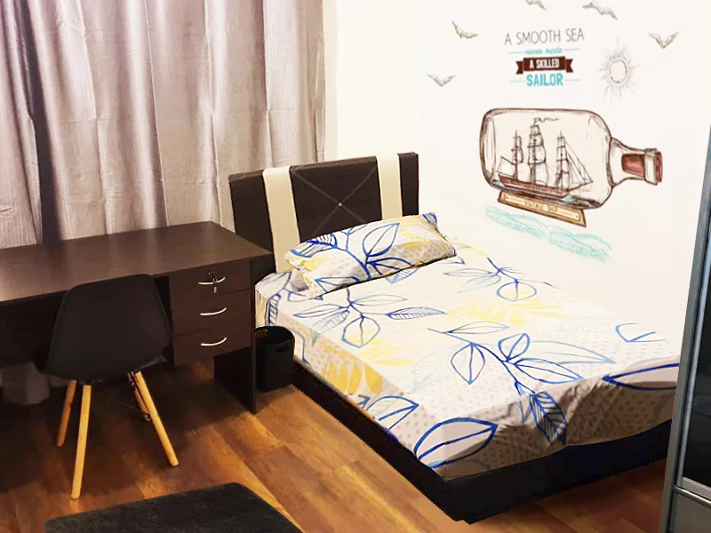 Bedroom features: single bed with patterned bedding, wooden bed frame, study desk with drawers, black chair with wooden legs, light grey curtains, wooden flooring, decorative wall art with ship in a bottle, wall-mounted artwork, bedside area with space for a lamp; style: modern.